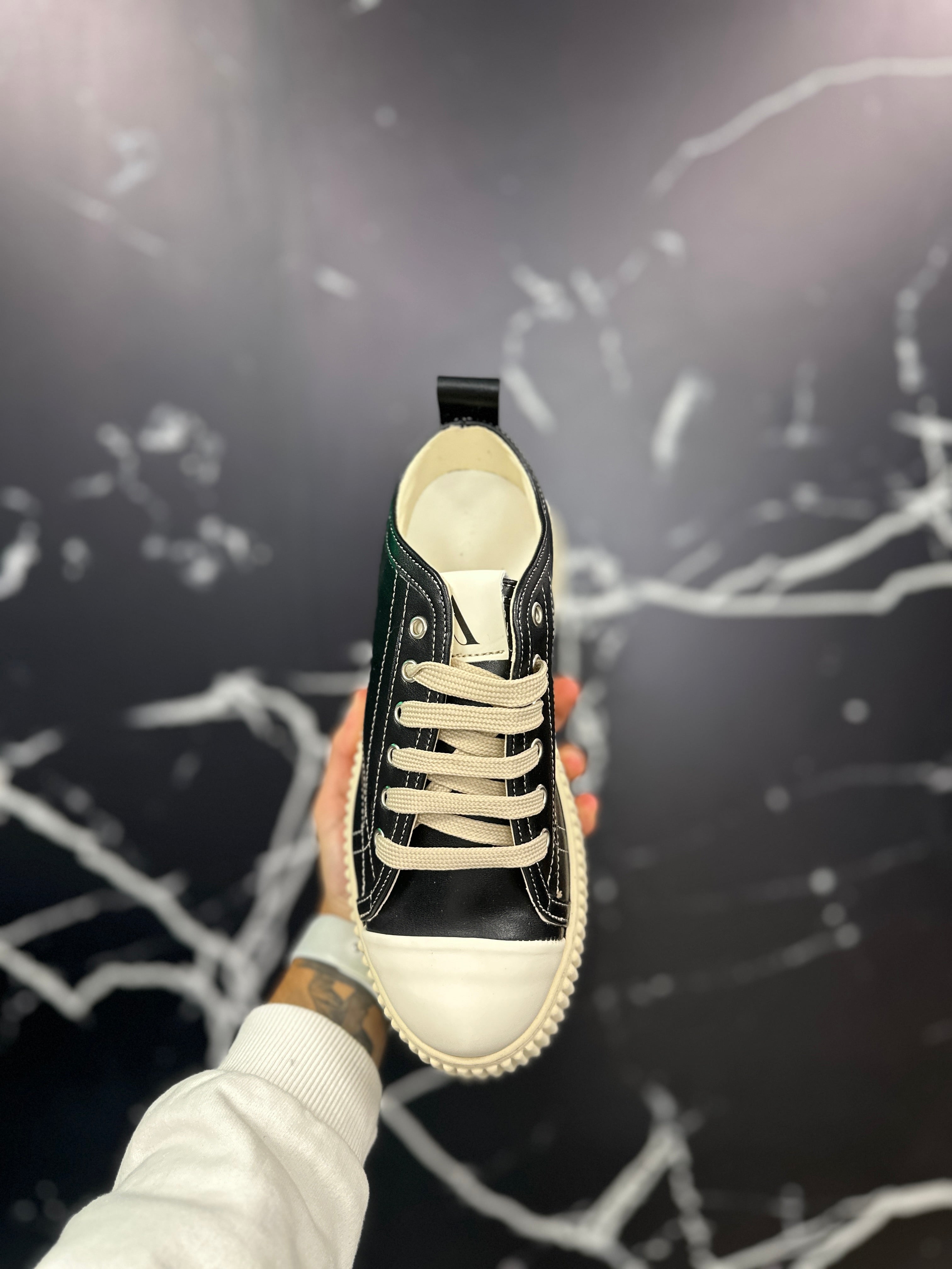 Sneakers in pelle